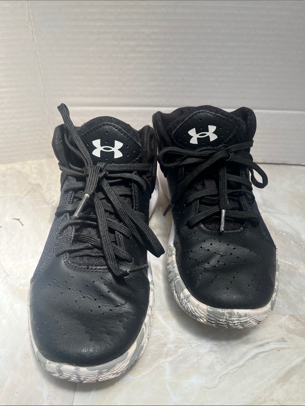 Under Armour Kids Black Sneakers with White Logo and Marbled White Sole